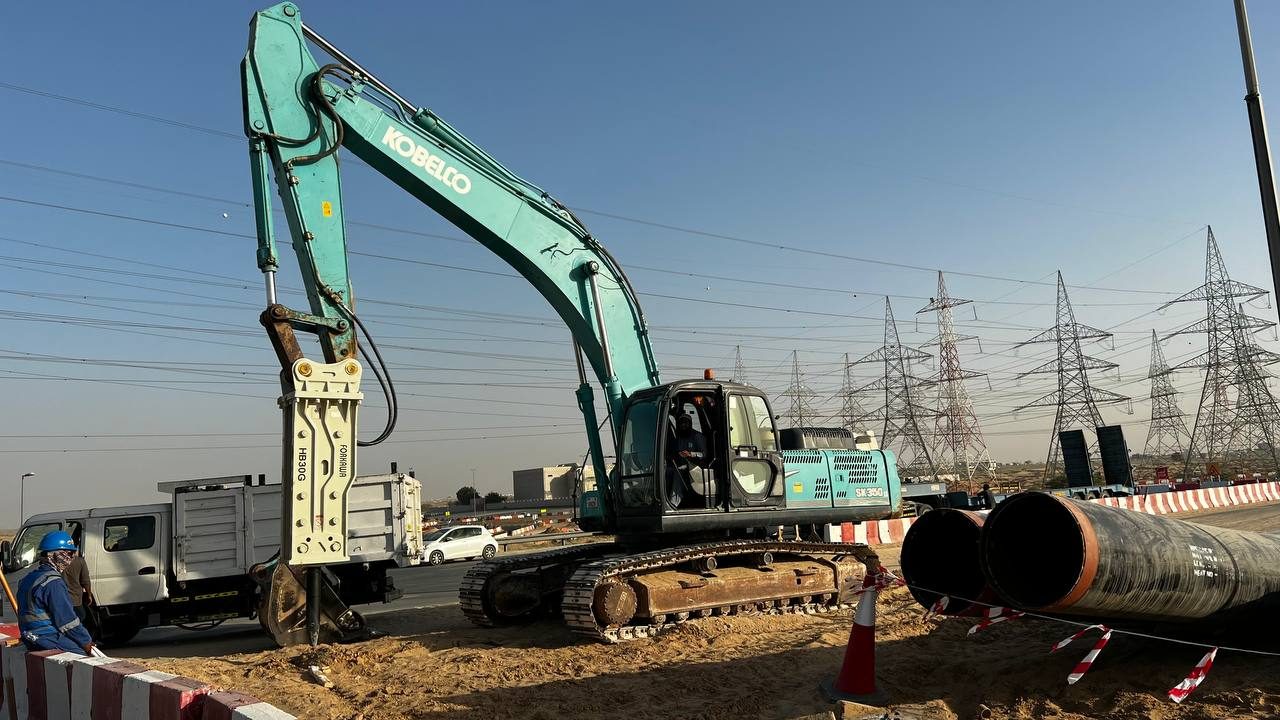 MACO Kobelco SK350 with HB30G hydraulic breaker on infrastructure works